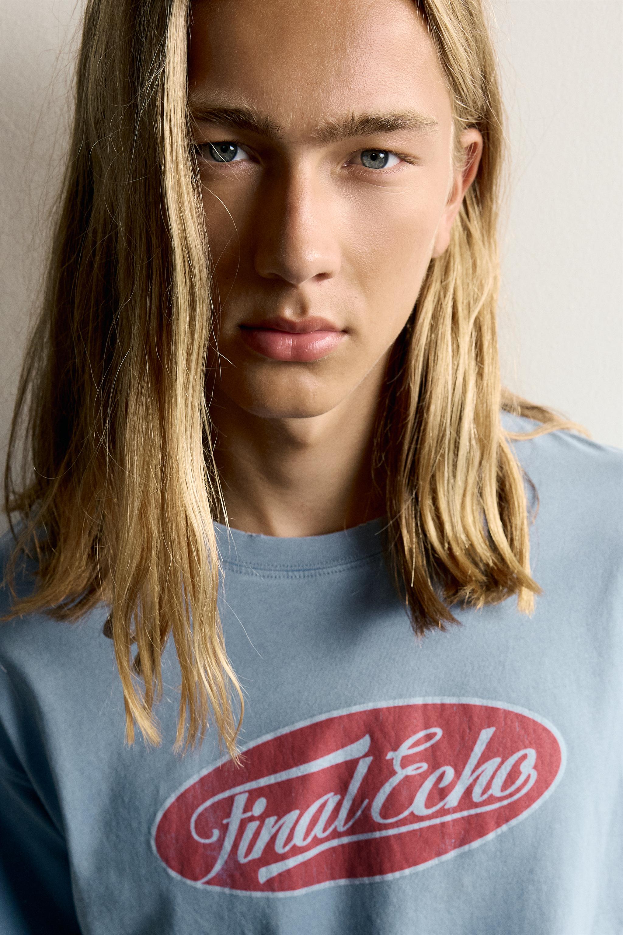 T-SHIRT DÉLAVÉ À IMPRIMÉS